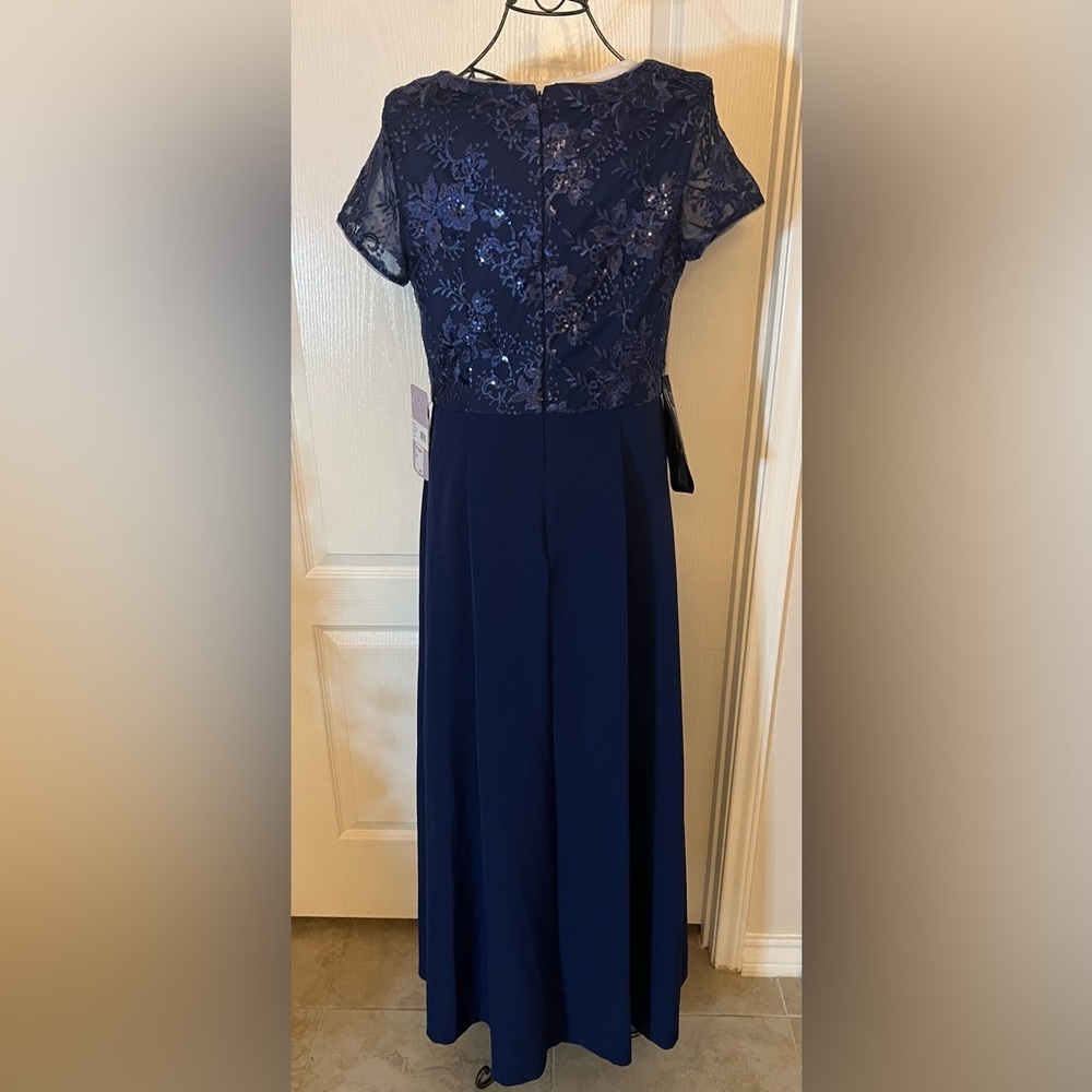 Rae Floral Embroidered Bow Detail A-Line Gown
JS Collections - Picture 5 of 13